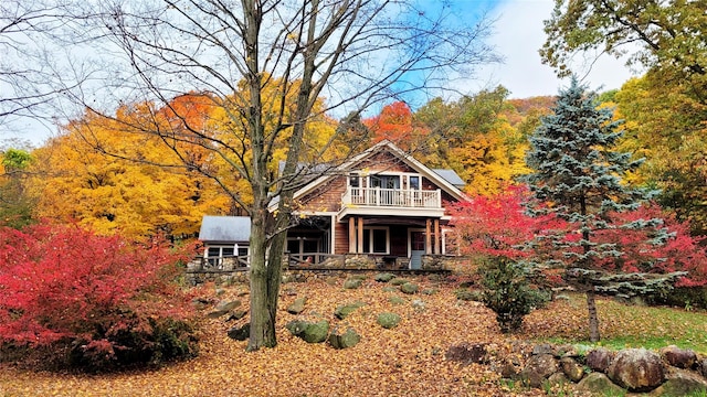 17 Half Moon Rdg, Cold Spring, NY 10516 - view of front facade with covered porch and a forest view