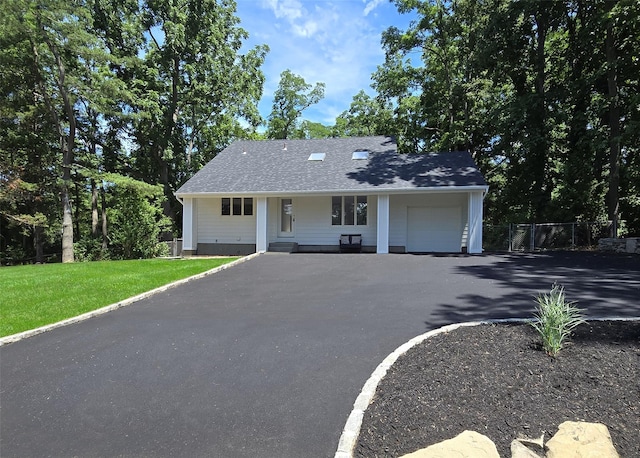 121 Lower Sheep Pasture Rd, East Setauket, NY 11733 - view of front facade with an attached garage, covered porch, and asphalt driveway