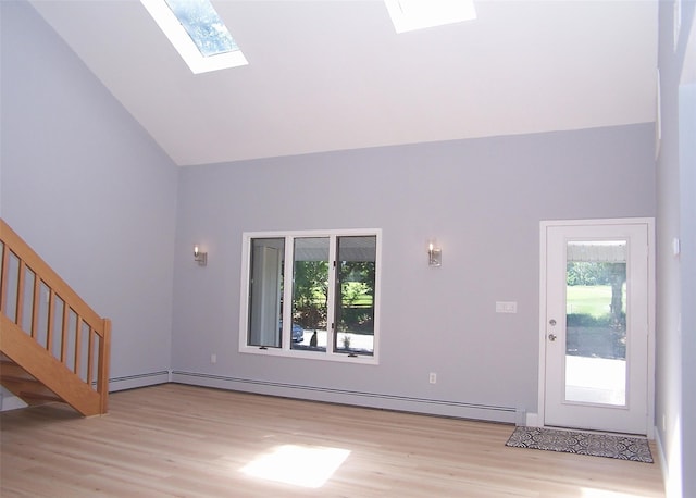 121 Lower Sheep Pasture Rd, East Setauket, NY 11733 - unfurnished living room with light wood-style flooring, plenty of natural light, a skylight, and high vaulted ceiling