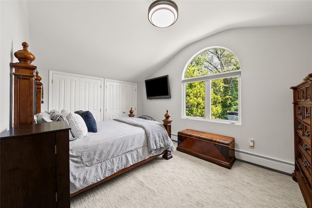 506 Kime Ave, West Islip, NY 11795 - bedroom with a baseboard radiator, lofted ceiling, and multiple closets