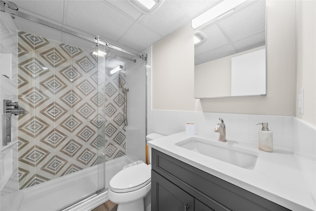 506 Kime Ave, West Islip, NY 11795 - full bath with a paneled ceiling, vanity, a stall shower, and tile walls