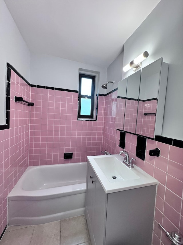 33-24 Junction Blvd Unit 6R, Jackson Heights, NY 11372 - full bathroom with tile walls, vanity, tile patterned flooring, and shower / washtub combination