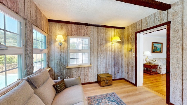 32 Biltmore Ave, Yonkers, NY 10710 - living area featuring wood finished floors and a textured ceiling