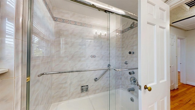 32 Biltmore Ave, Yonkers, NY 10710 - full bath with bath / shower combo with glass door and wood finished floors