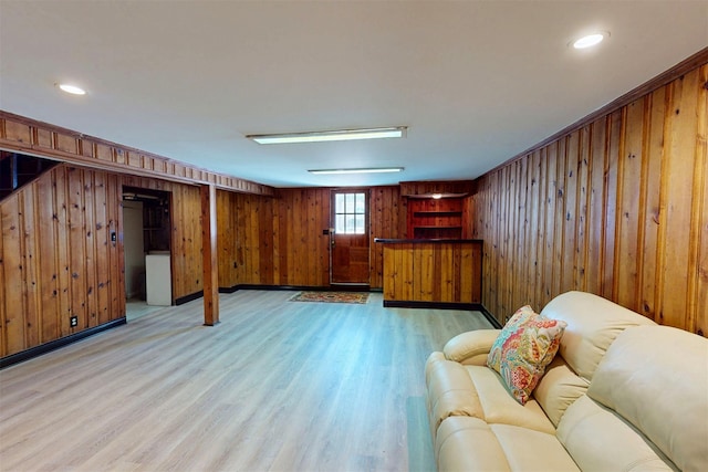 32 Biltmore Ave, Yonkers, NY 10710 - living room featuring wood walls and light wood-type flooring