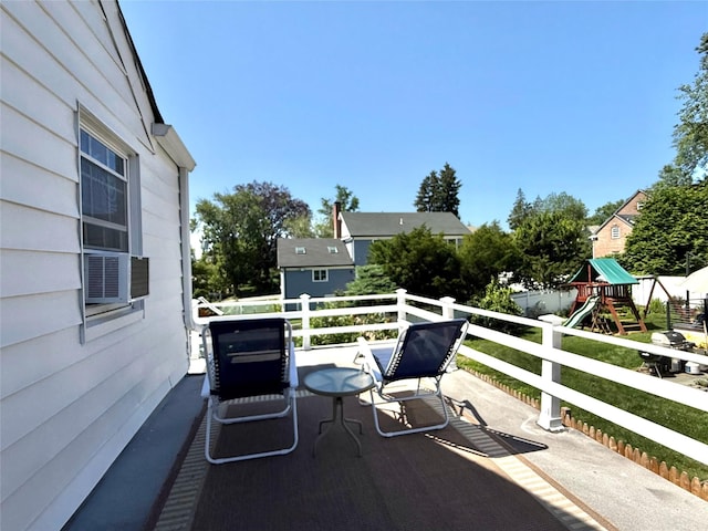 32 Biltmore Ave, Yonkers, NY 10710 - wooden terrace featuring a playground