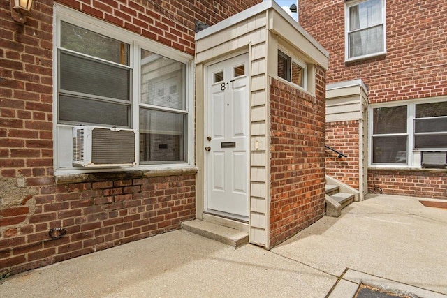81 Edwards St Unit T, Roslyn Heights, NY 11577 - entrance to property featuring brick siding