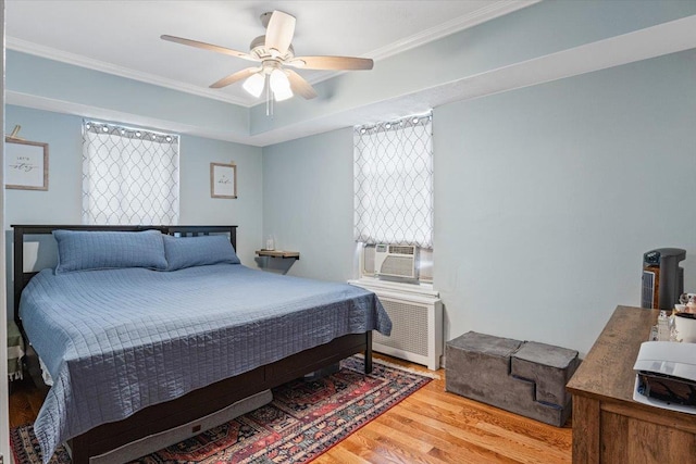 81 Edwards St Unit T, Roslyn Heights, NY 11577 - bedroom featuring cooling unit, wood finished floors, ornamental molding, and ceiling fan
