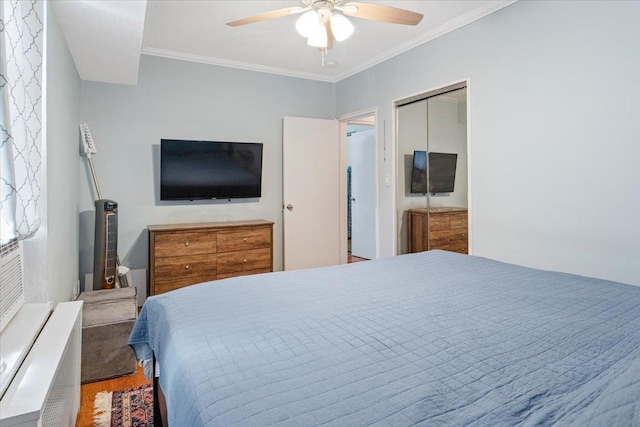 81 Edwards St Unit T, Roslyn Heights, NY 11577 - bedroom featuring crown molding, ceiling fan, and wood finished floors