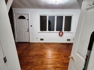 353 Litchfield Ave, Babylon, NY 11702 - foyer entrance with wood finished floors and baseboards