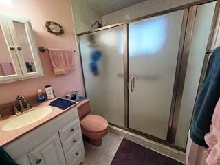 353 Litchfield Ave, Babylon, NY 11702 - full bath featuring a shower stall, vanity, and tile patterned flooring