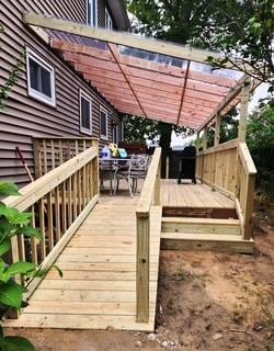 353 Litchfield Ave, Babylon, NY 11702 - wooden terrace with a pergola