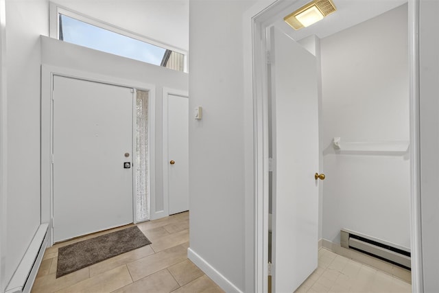 582 Heritage Hls Unit A, Somers, NY 10589 - entrance foyer with a baseboard heating unit, baseboard heating, and light tile patterned floors