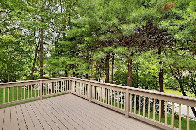 582 Heritage Hls Unit A, Somers, NY 10589 - wooden deck featuring view of wooded area