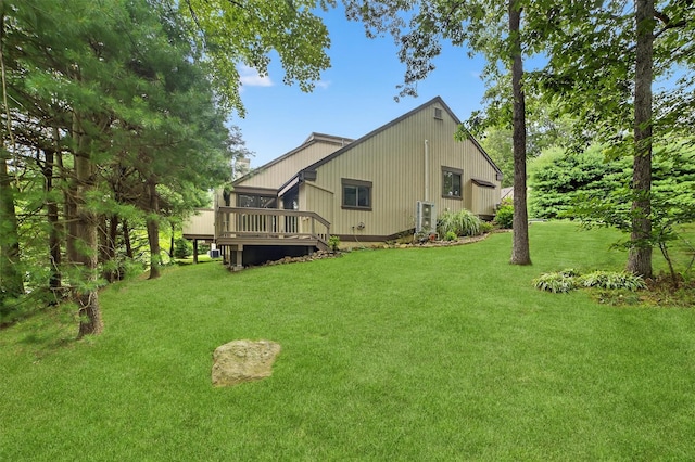582 Heritage Hls Unit A, Somers, NY 10589 - back of property with a deck and a yard
