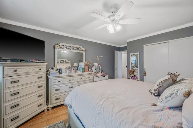 18 Ivy St Unit 4A, Farmingdale, NY 11735 - bedroom with light wood-type flooring, ornamental molding, ceiling fan, and a closet