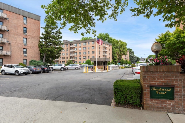 6 Birchwood Ct Unit 4C, Mineola, NY 11501 - view of apartment building / complex featuring uncovered parking