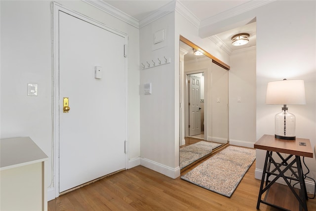 6 Birchwood Ct Unit 4C, Mineola, NY 11501 - entrance foyer featuring wood finished floors and ornamental molding