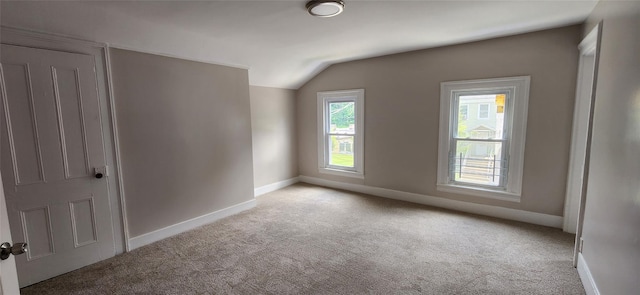 117 Talmadge St, Poughkeepsie, NY 12601 - unfurnished room featuring light colored carpet and lofted ceiling