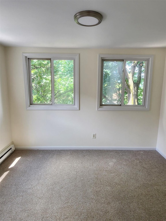 117 Talmadge St, Poughkeepsie, NY 12601 - unfurnished room with carpet and a baseboard radiator