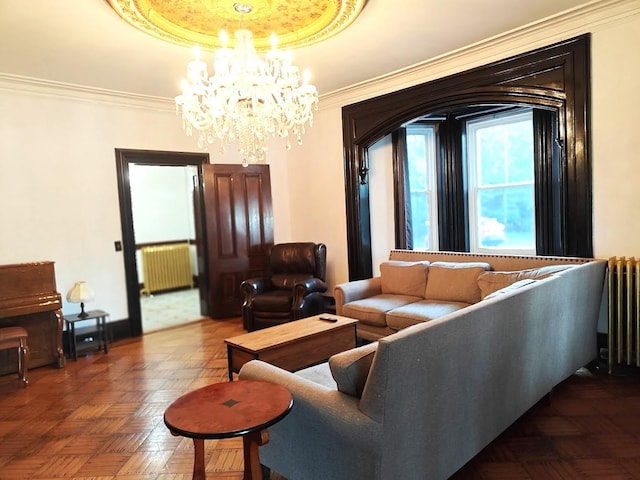 12 Monell Pl, Beacon, NY 12508 - living room featuring radiator heating unit, a chandelier, ornamental molding, and a tray ceiling