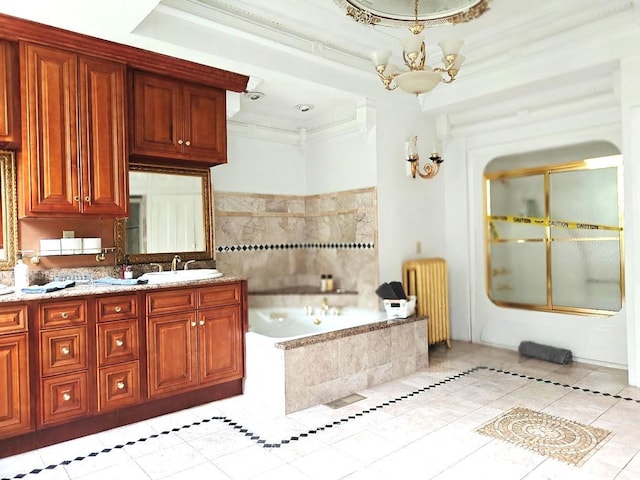 12 Monell Pl, Beacon, NY 12508 - bathroom featuring radiator, a garden tub, tile patterned floors, vanity, and a chandelier