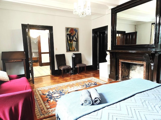 12 Monell Pl, Beacon, NY 12508 - living area with a chandelier, crown molding, and a fireplace