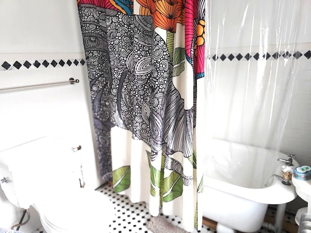 12 Monell Pl, Beacon, NY 12508 - full bathroom featuring shower / tub combo with curtain and tile walls