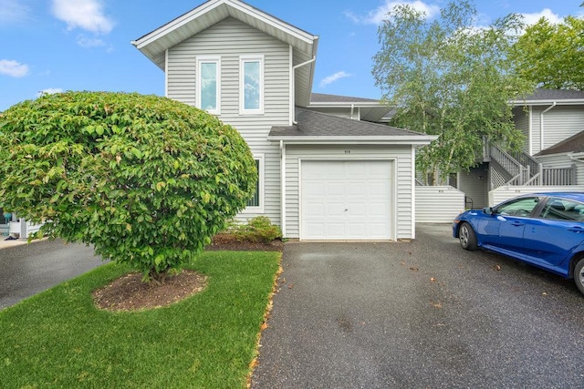 914 Fenway Rd, Saint James, NY 11780 - traditional-style house with driveway, an attached garage, and roof with shingles