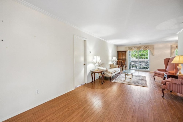 914 Fenway Rd, Saint James, NY 11780 - living area featuring light wood finished floors and ornamental molding