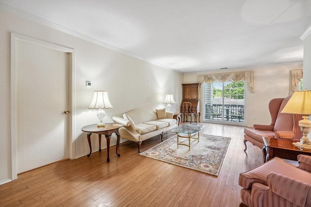 914 Fenway Rd, Saint James, NY 11780 - living room with light wood-style flooring and crown molding
