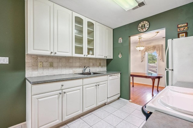 914 Fenway Rd, Saint James, NY 11780 - kitchen with white appliances, glass insert cabinets, backsplash, white cabinetry, and light tile patterned floors