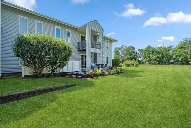 914 Fenway Rd, Saint James, NY 11780 - view of grassy yard with a balcony