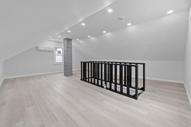 19432 113th Rd, Hollis, NY 11412 - additional living space with light wood-style flooring, lofted ceiling, and recessed lighting
