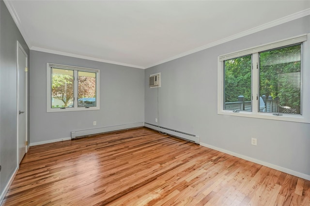 31 Neptune Ave, Mastic, NY 11950 - unfurnished room featuring a baseboard heating unit, plenty of natural light, wood finished floors, and crown molding