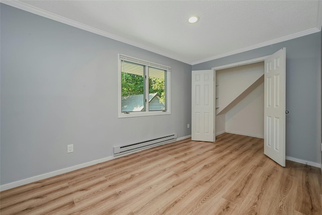 31 Neptune Ave, Mastic, NY 11950 - unfurnished bedroom featuring a baseboard heating unit, ornamental molding, wood finished floors, and recessed lighting