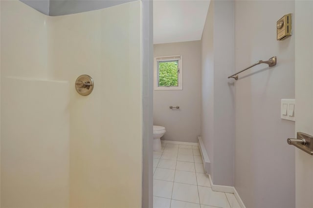 31 Neptune Ave, Mastic, NY 11950 - bathroom with a shower, tile patterned floors, and a baseboard heating unit