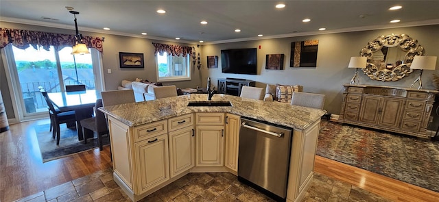 12 Omni Parc Dr, Nanuet, NY 10954 - kitchen with cream cabinets, stainless steel dishwasher, crown molding, open floor plan, and light stone countertops
