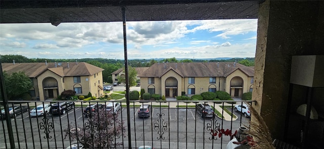 12 Omni Parc Dr, Nanuet, NY 10954 - view of front facade featuring uncovered parking, a balcony, and a residential view