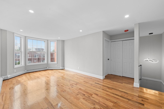 1070 Kelly St, Bronx, NY 10459 - spare room with light wood-type flooring and recessed lighting