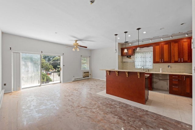 11501 Linden Blvd, South Ozone Park, NY 11420 - kitchen featuring ceiling fan, open floor plan, decorative backsplash, and a kitchen island