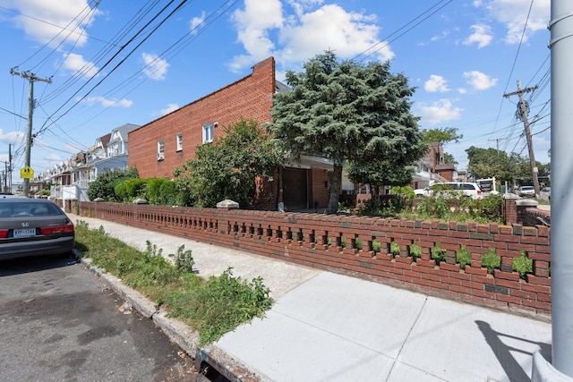 11501 Linden Blvd, South Ozone Park, NY 11420 - view of building exterior featuring a residential view
