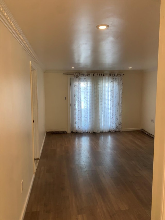 6 2nd Pl, Roosevelt, NY 11575 - spare room featuring wood finished floors, recessed lighting, and crown molding
