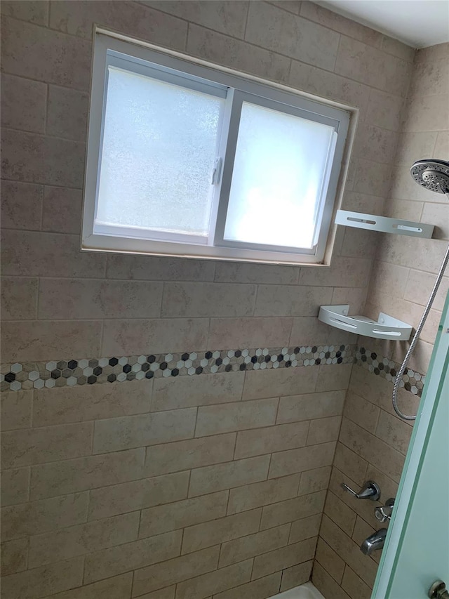 6 2nd Pl, Roosevelt, NY 11575 - full bathroom with plenty of natural light and bathing tub / shower combination