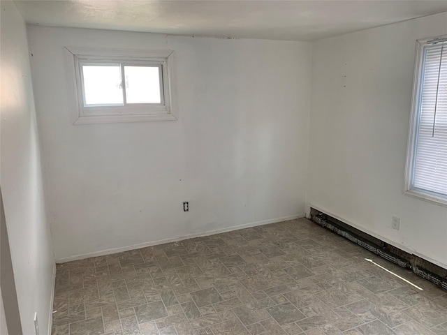6 2nd Pl, Roosevelt, NY 11575 - empty room featuring baseboards