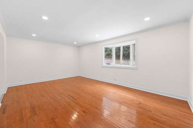 690 Corbalis Pl, Yonkers, NY 10703 - empty room featuring wood finished floors, ornamental molding, and recessed lighting