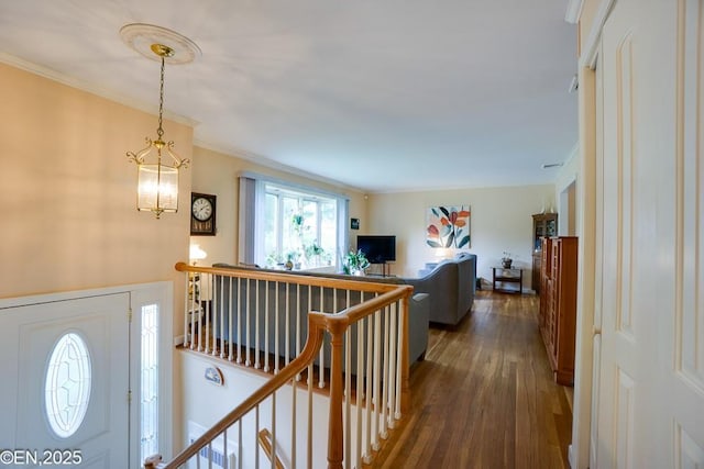 193 Washington Ave, Tappan, NY 10983 - foyer featuring ornamental molding, dark wood-type flooring, and a chandelier