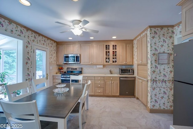 193 Washington Ave, Tappan, NY 10983 - kitchen with appliances with stainless steel finishes, a ceiling fan, crown molding, light brown cabinets, and light countertops