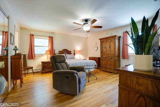193 Washington Ave, Tappan, NY 10983 - bedroom featuring baseboard heating, ornamental molding, light wood-style flooring, and ceiling fan