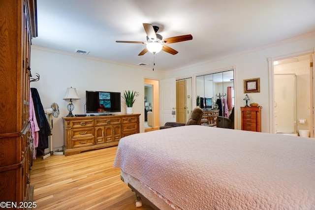 193 Washington Ave, Tappan, NY 10983 - bedroom featuring multiple closets, light wood-style floors, crown molding, ceiling fan, and ensuite bathroom